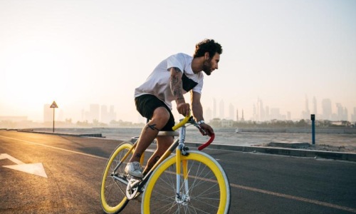 Find your perfect fit at Waterford Cherry Creek a man riding a bicycle on a road