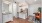 a kitchen with white cabinets
