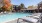 a swimming pool with chairs around it