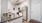 a kitchen with white cabinets