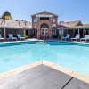 a pool with chairs around it