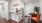 a kitchen with a table and chairs